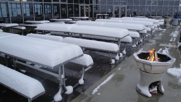 Snow on the picnic tables at CP 